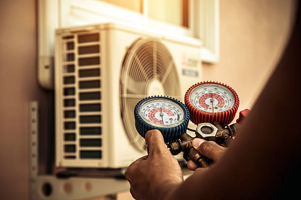 Professional Ac Installation technician working in Lake Mills, WI